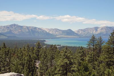 A view overlooking Lake Tahoe with mountains visible in the distance